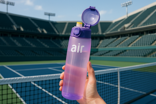 Botella en cancha tenis